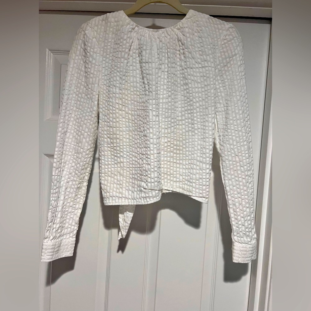 Open back seersucker blouse.